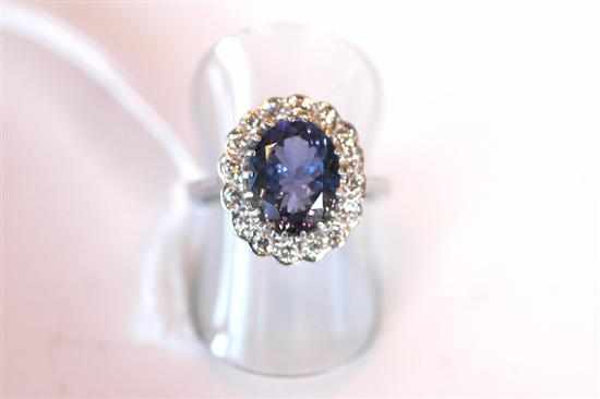 Appraisal: A TANZANITE AND DIAMOND DRESS RING IN CT GOLD