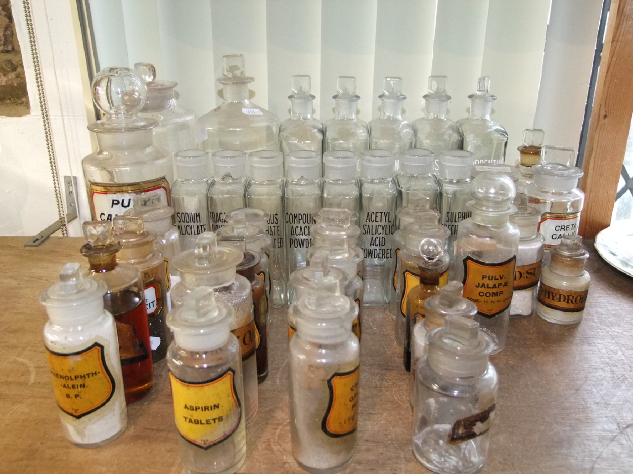 Appraisal: A collection of early th century chemists medicinal bottles and