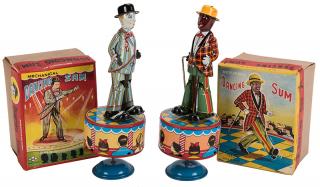 Appraisal: S E Mechanical Dancing Sam Wind-Up Toys Japanese wind-up tin