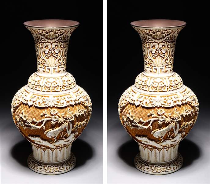 Appraisal: Pair of Chinese carved wood on metal vases with birds