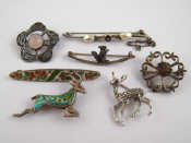 Appraisal: A mixed lot comprising seven brooches five in white metal