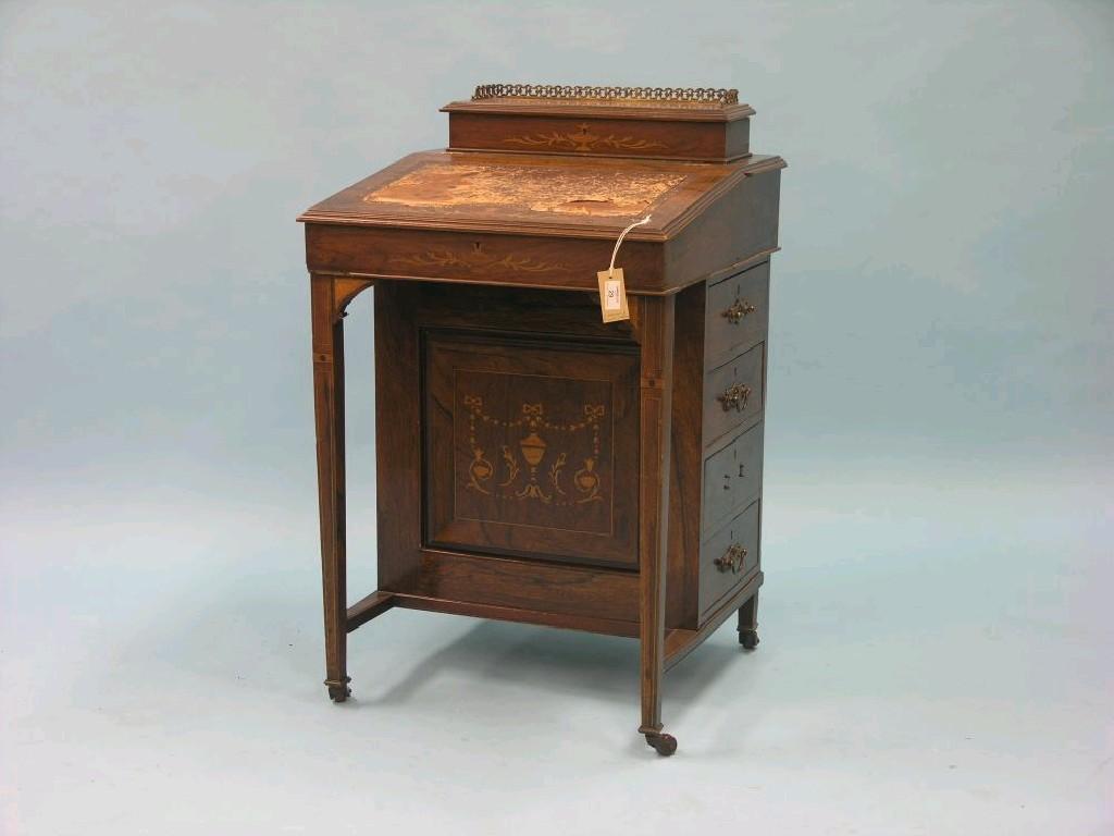 Appraisal: An Edwardian inlaid rosewood Davenport enclosed stationery compartment with gilt-brass