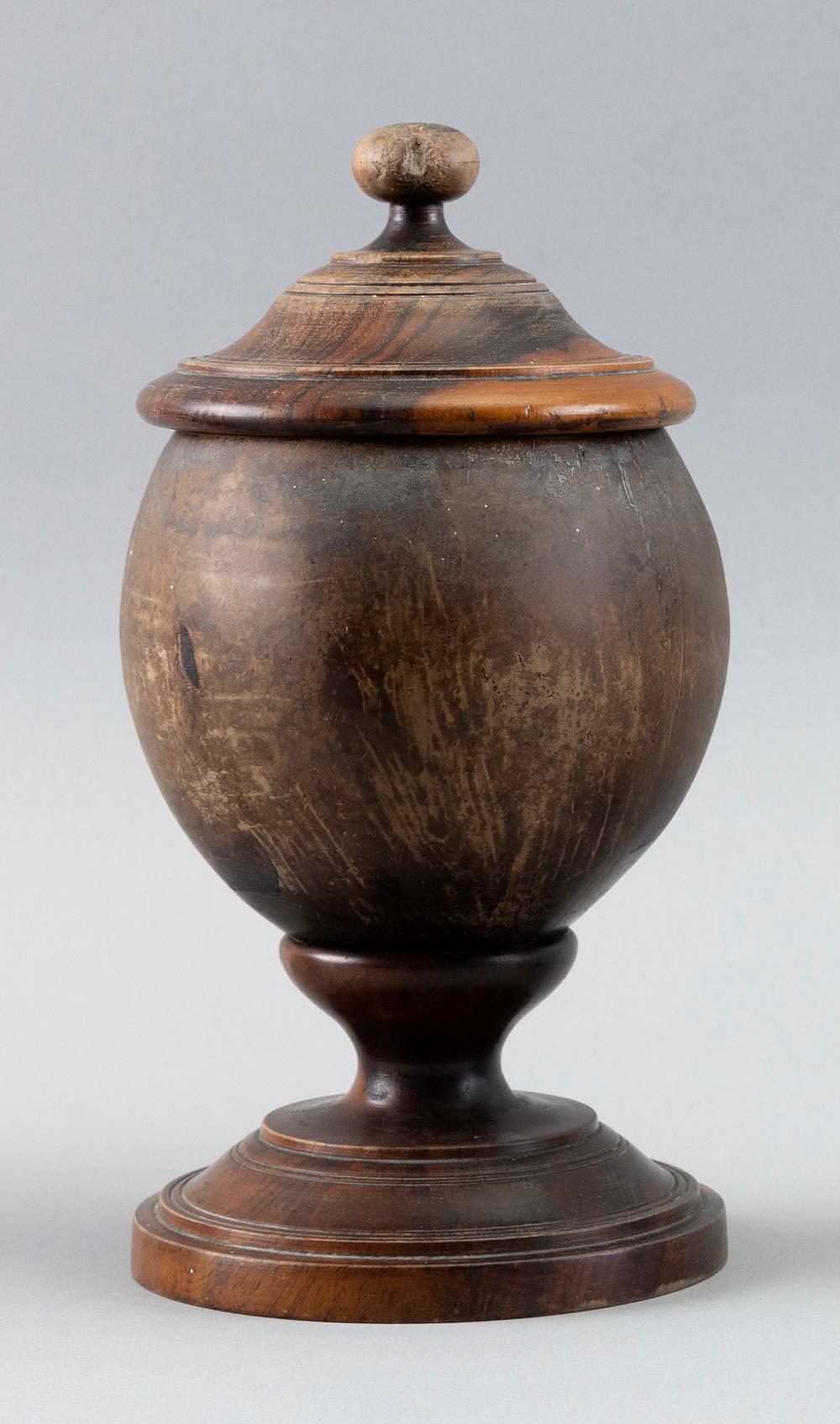 Appraisal: ROSEWOOD AND COCONUT SHELL FOOTED AND LIDDED JAR FIRST HALF