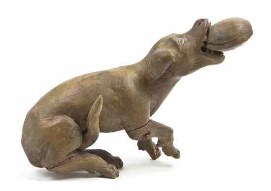 Appraisal: A Continental Carved and Painted Wood Figure of a Dog