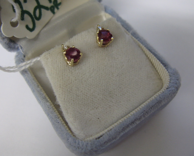 Appraisal: PAIR OF RUBY DIAMOND AND FOURTEEN KARAT GOLD EARSTUDS each