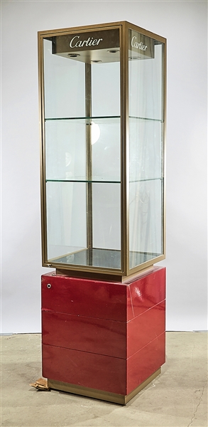 Appraisal: Cartier display case with two glass shelves and lower compartment