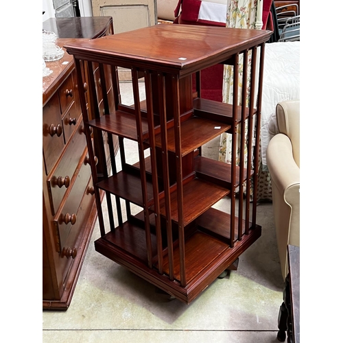 Appraisal: Revolving bookcase approx cm H x cm W x cm