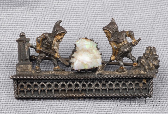 Appraisal: Silver-gilt and Opal Pin designed as dwarfs working a boulder