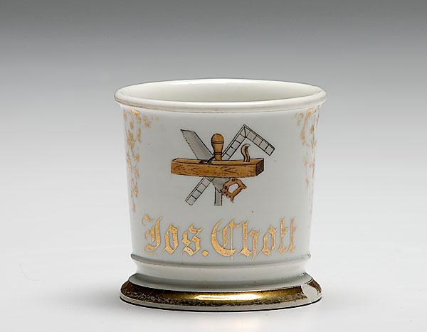 Appraisal: CARPENTER'S OCCUPATIONAL SHAVING MUG porcelain with polychrome painted scene of