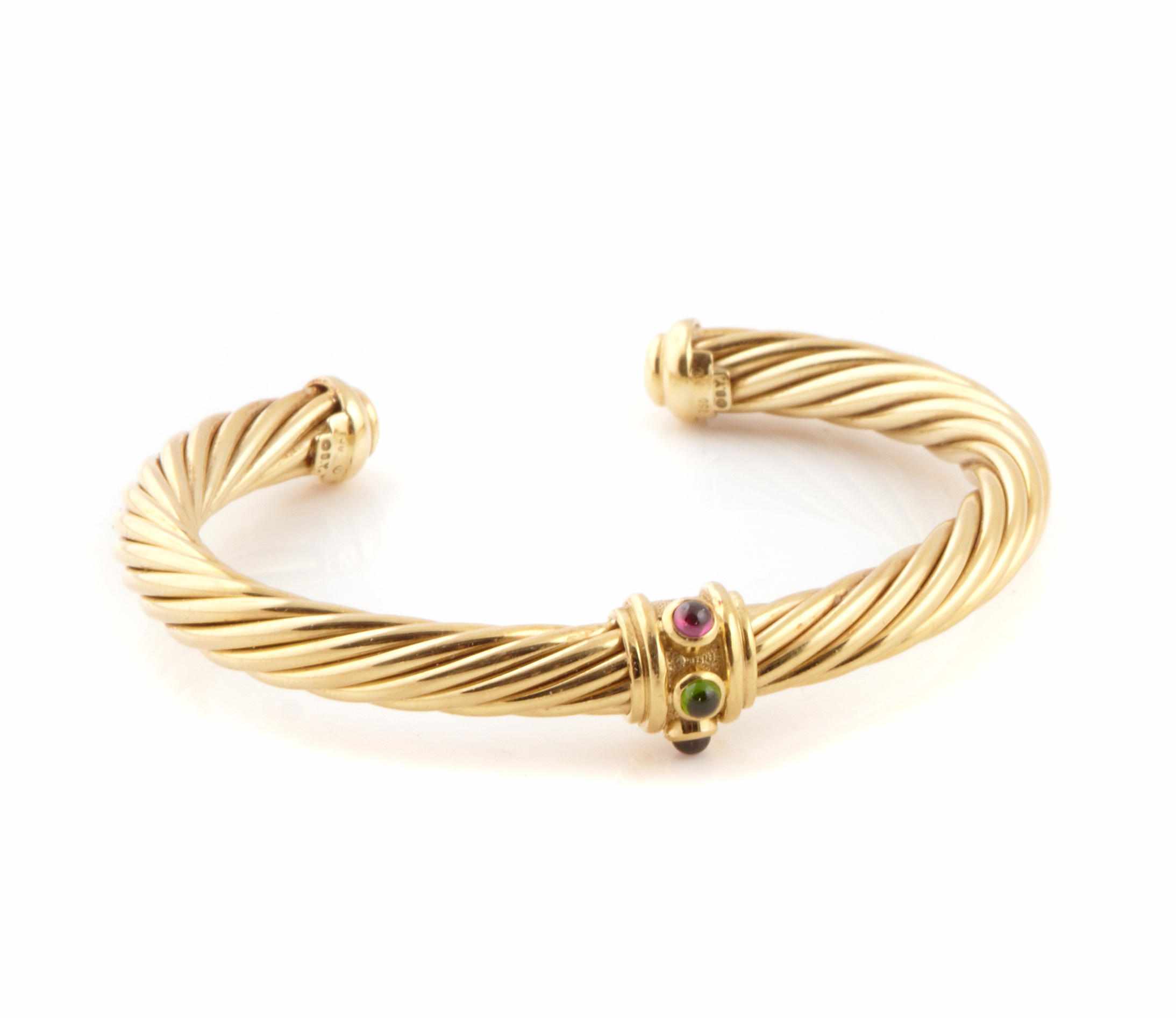 Appraisal: A gem-set and k gold twist bangle David Yurman with