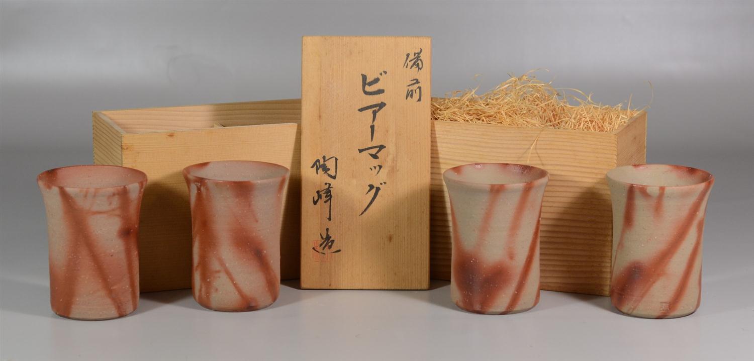 Appraisal: Japanese stoneware pottery cups in original wooden boxes - h