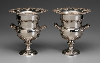 Appraisal: Pair Silver-Plated Champagne Coolers probably English modern urn form foliate