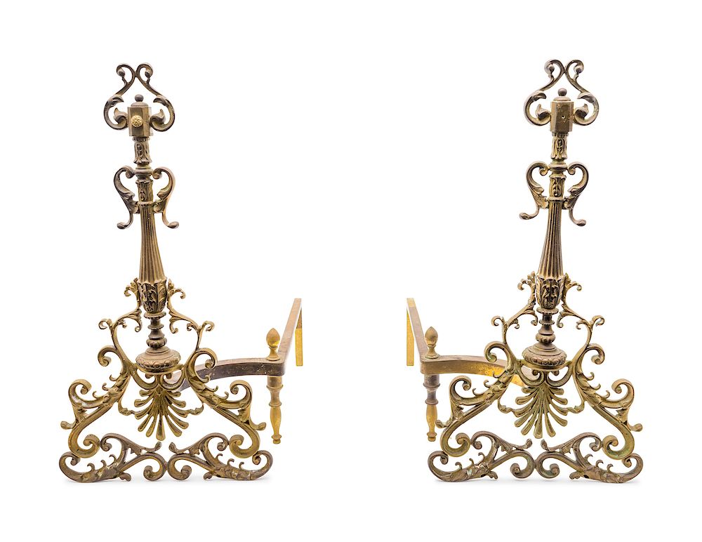 Appraisal: A Pair of Continental Brass Andirons and a Fire Fender