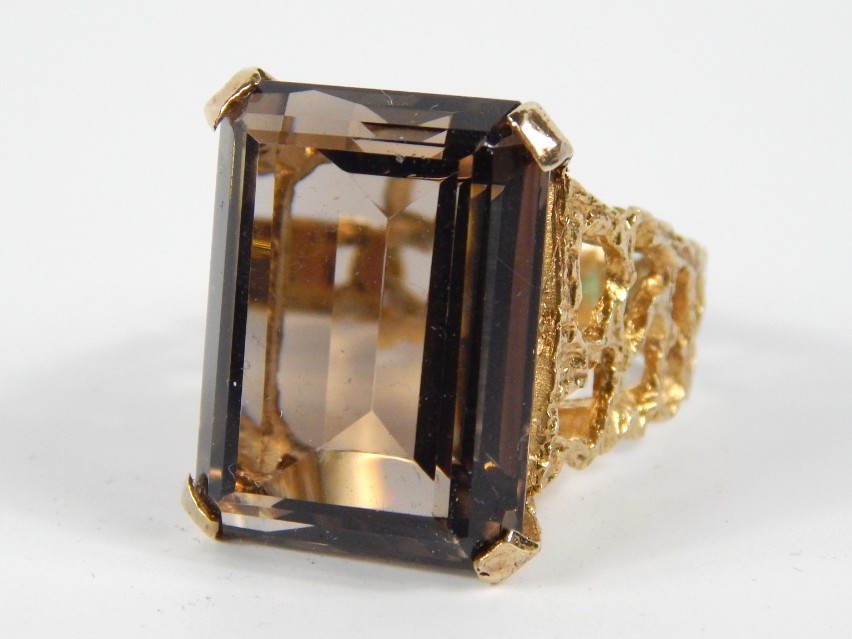 Appraisal: A ct gold and smoky quartz dress ring baguette cut