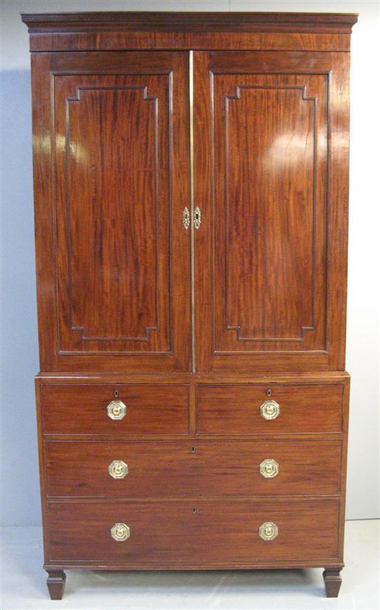 Appraisal: George III mahogany linen press the interior with one tray