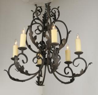 Appraisal: Wrought iron th century wrought iron -light chandelier with C-scroll