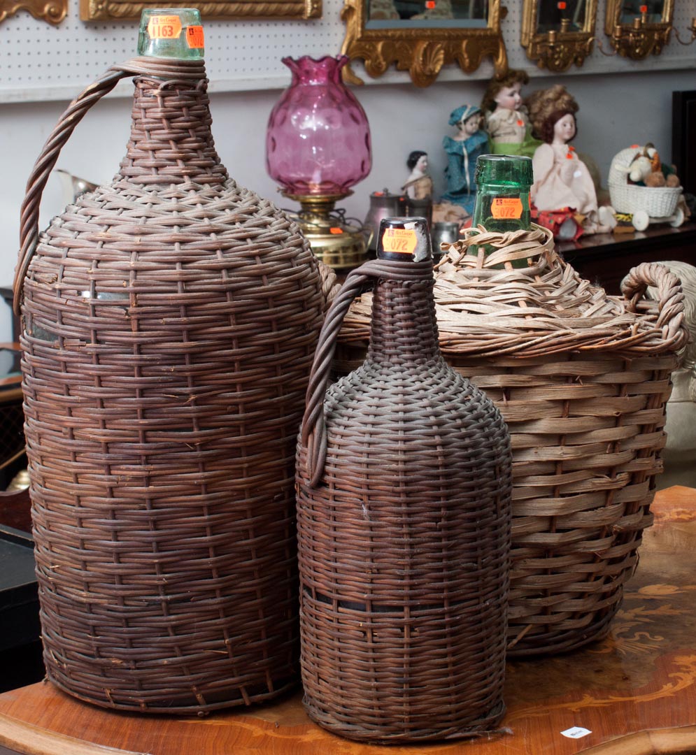 Appraisal: Three wicker encased blown glass demijohns first half- th century