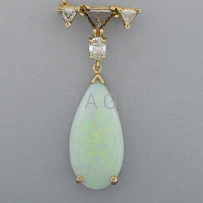 Appraisal: OPAL COLORLESS AND COGNAC DIAMOND PENDANT BROOCH Opal teardrop cts