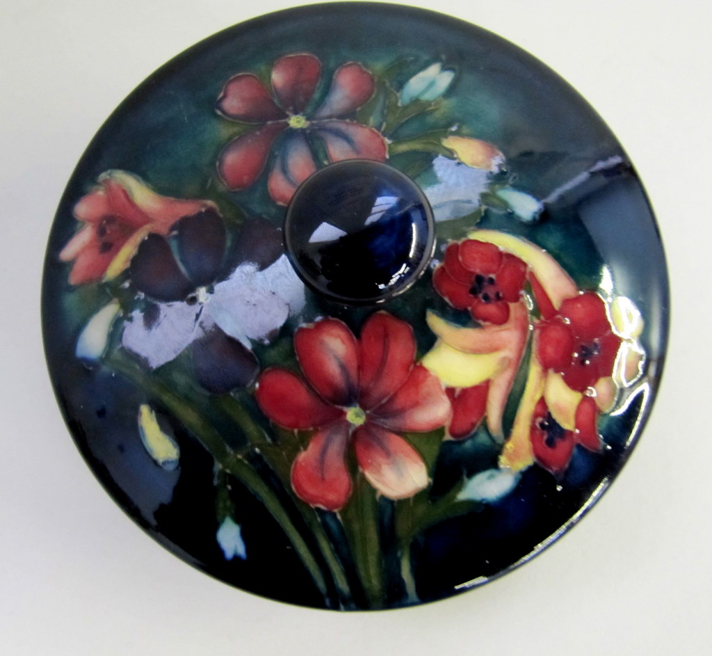 Appraisal: Moorcroft 'Spring Flowers' pattern powder bowl and lid with blue-green