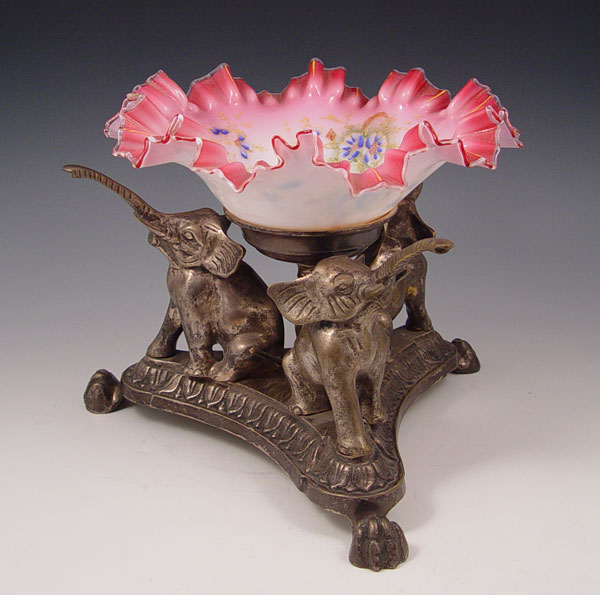 Appraisal: VICTORIAN CRANBERRY ART GLASS BRIDES BOWL ON FIGURAL ELEPHANT STAND