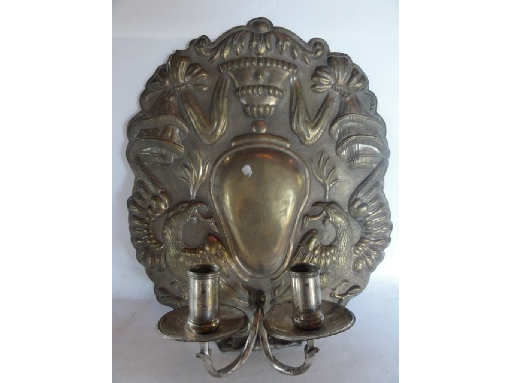 Appraisal: A th century gilt metal two divisional candle sconce the