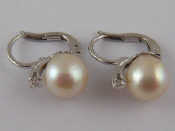 Appraisal: A pair of white metal tests carat gold cultured pearl