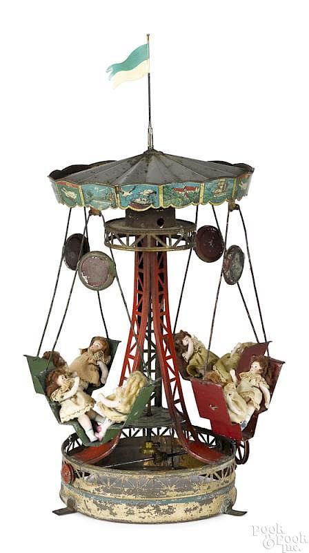 Appraisal: Muller Kadader painted tin lithograph carousel Muller Kadader painted tin