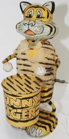 Appraisal: CA MARX TIN LITHOGRAPH FUNNY TIGER TOYTHAT PLAYS A DRUM