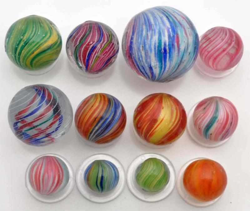 Appraisal: Lot of Handmade Marbles Description Includes nine multicolored onionskins one