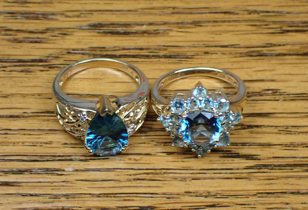 Appraisal: TWO BLUE TOPAZ AND YELLOW GOLD RINGS including a k