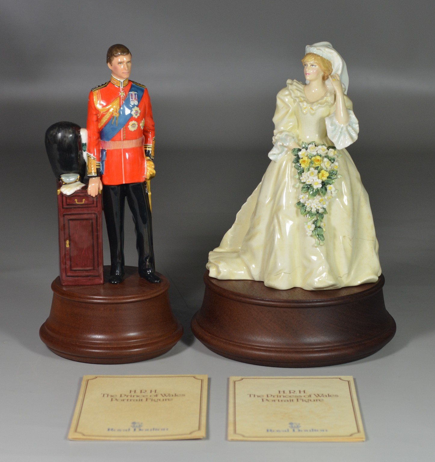 Appraisal: Royal Doulton bone china figurines HRH Prince Charles Princess Diana