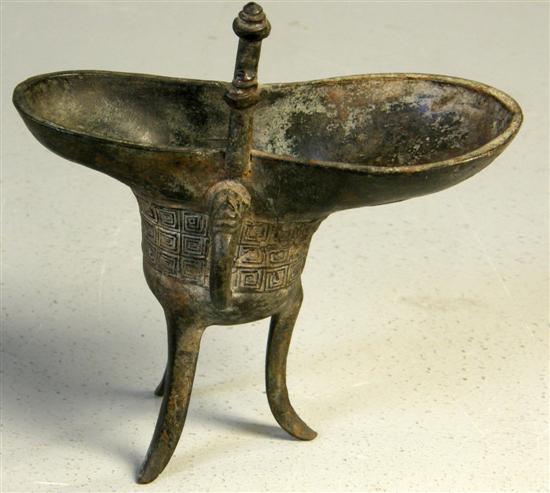 Appraisal: th Century Chinese bronze tripod censer with shaped oval top