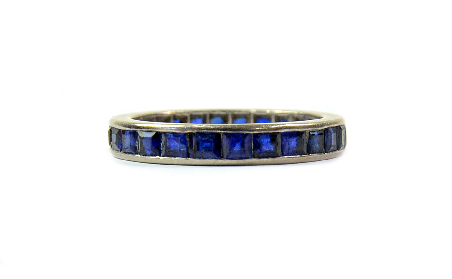 Appraisal: A sapphire eternity ring the calibre set stones in a