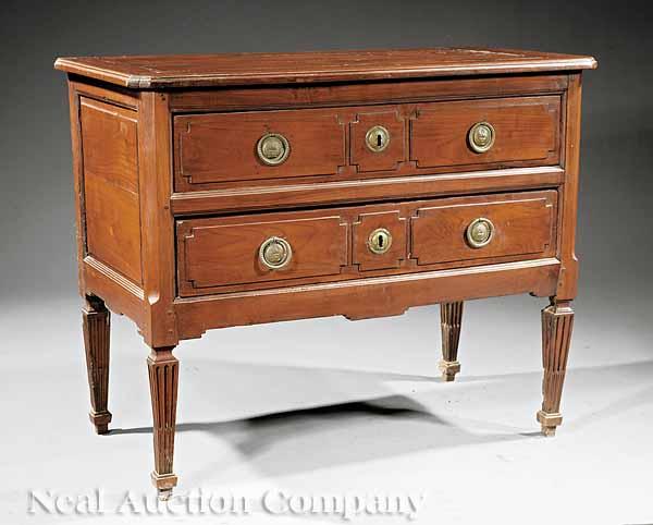 Appraisal: A Louis XVI Fruitwood Commode late th c molded top