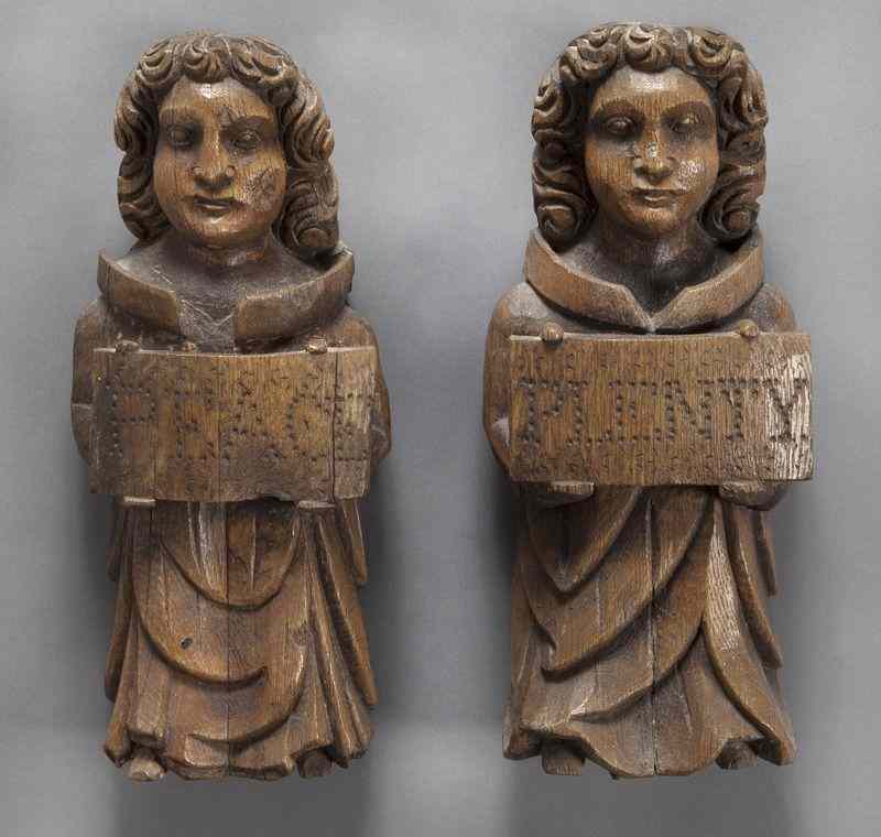 Appraisal: Pr English carved wood angel wall mounts each holding a