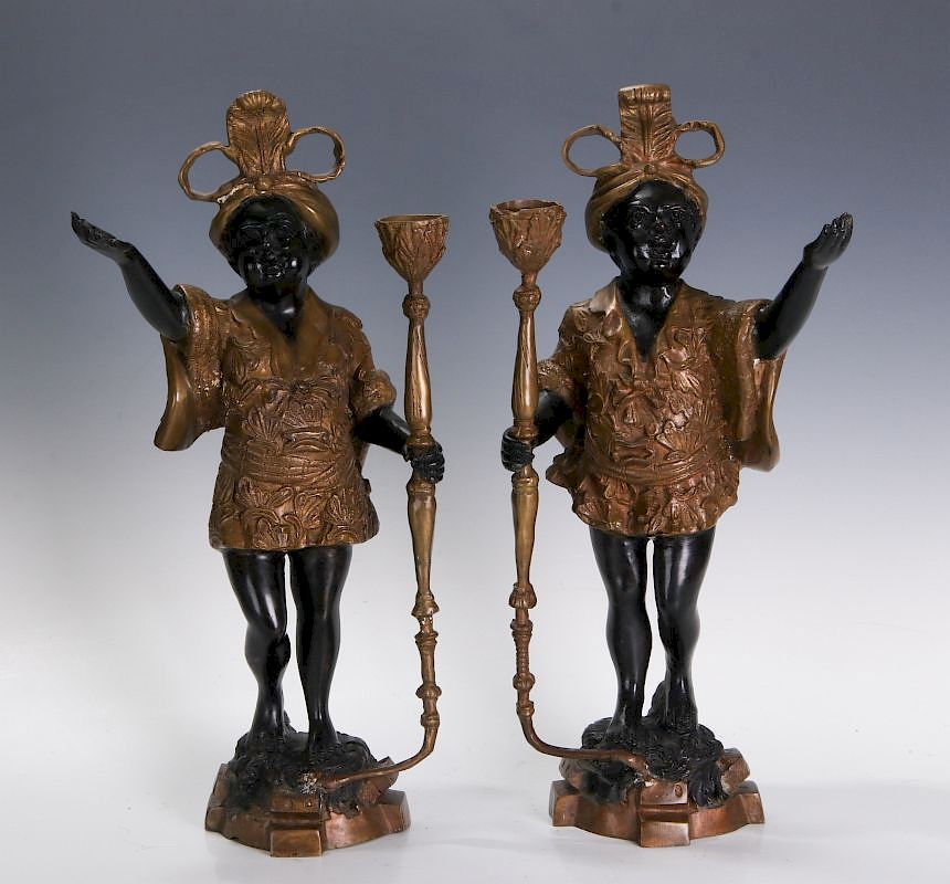 Appraisal: A LATE TH C PAIR BRONZE PUTTO BLACKAMOOR FIGURES Detailed