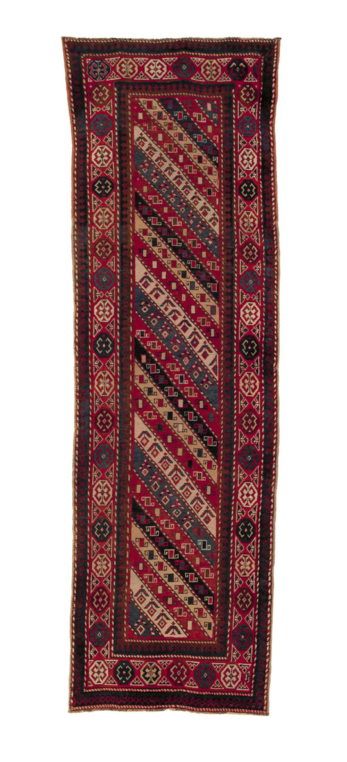 Appraisal: Caucasian runner ca with a diagonal stripe field and multiple