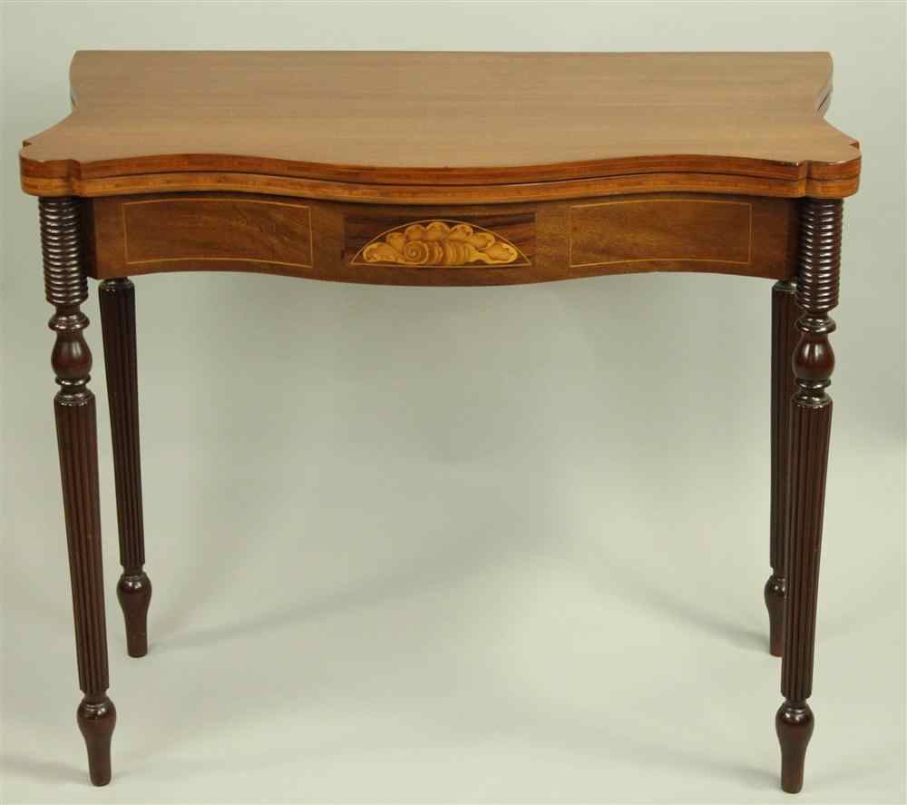 Appraisal: AMERICAN SHERATON INLAID MAHOGANY CARD TABLE having a rectangular form