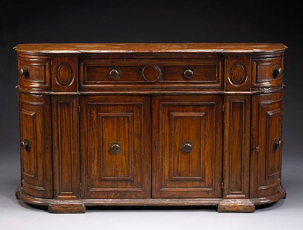 Appraisal: An Italian Baroque style walnut credenza height in width ft