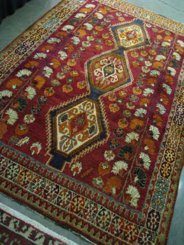 Appraisal: Oriental Afghan rug traditional dark red brown with floral and