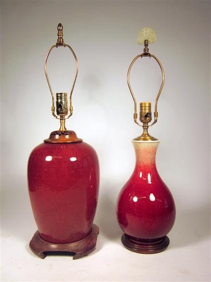 Appraisal: Two Chinese red glazed porcelain vasesComprising a pear form langyao