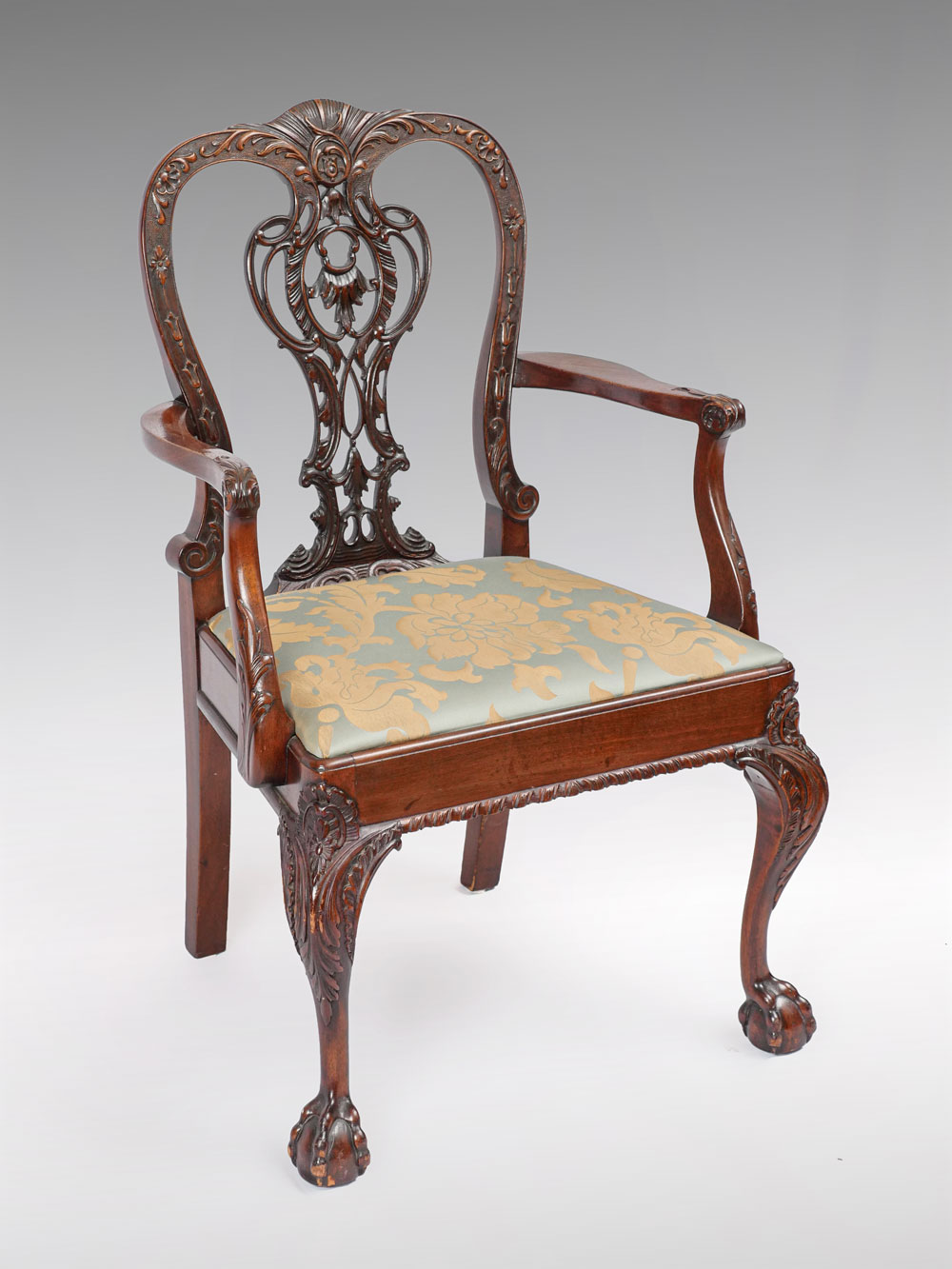 Appraisal: IRISH CHIPPENDALE BALL AND CLAW ARMCHAIR Beautifully carved Irish Chippendale