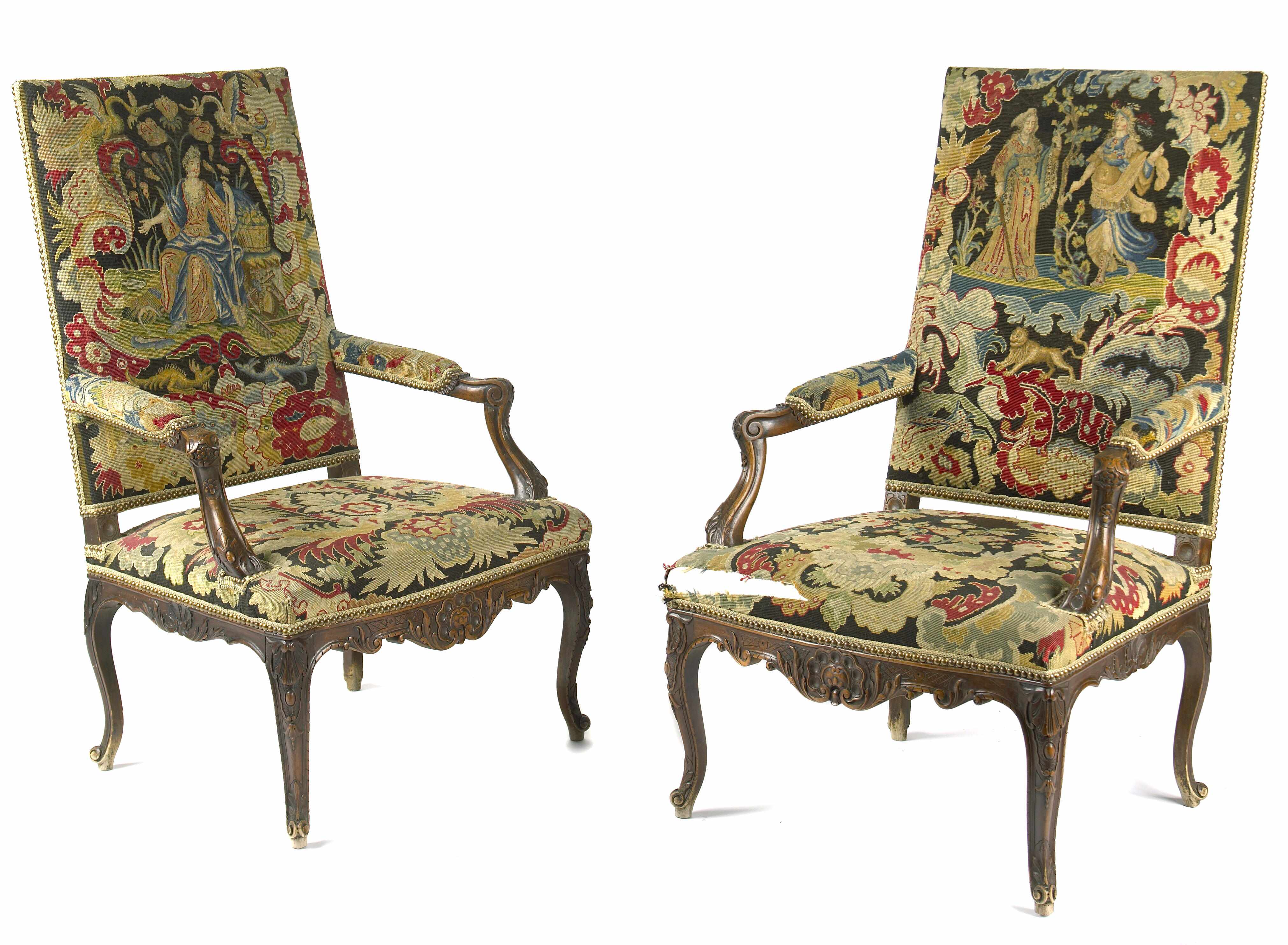 Appraisal: A pair of Rgence style carved walnut fauteuils with needlework