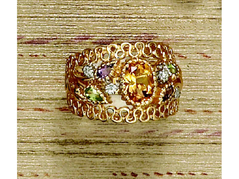 Appraisal: CITRINE RING k yellow gold open design ring set with