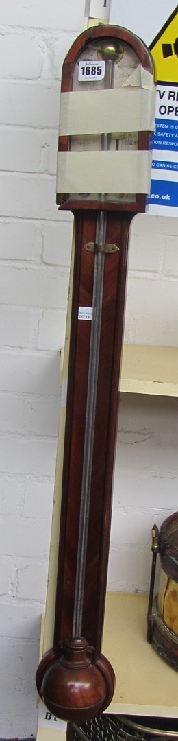 Appraisal: A mahogany stick barometer th century the silvered plate detailed