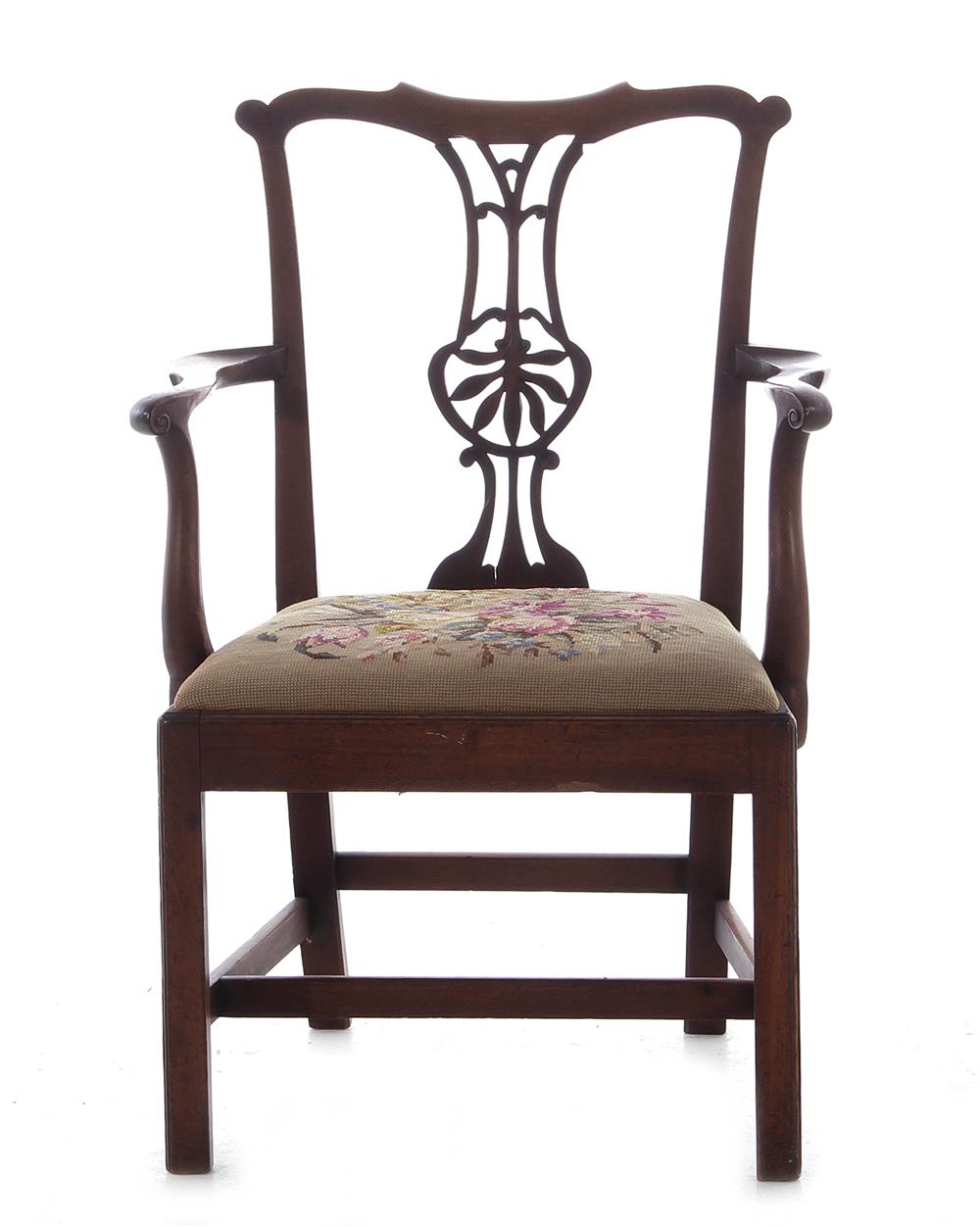 Appraisal: George III carved mahogany armchair circa yoke crest pierced splat