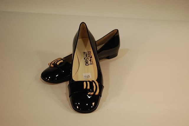 Appraisal: Salvatore Ferragamo black patent calf flats with tan front detail