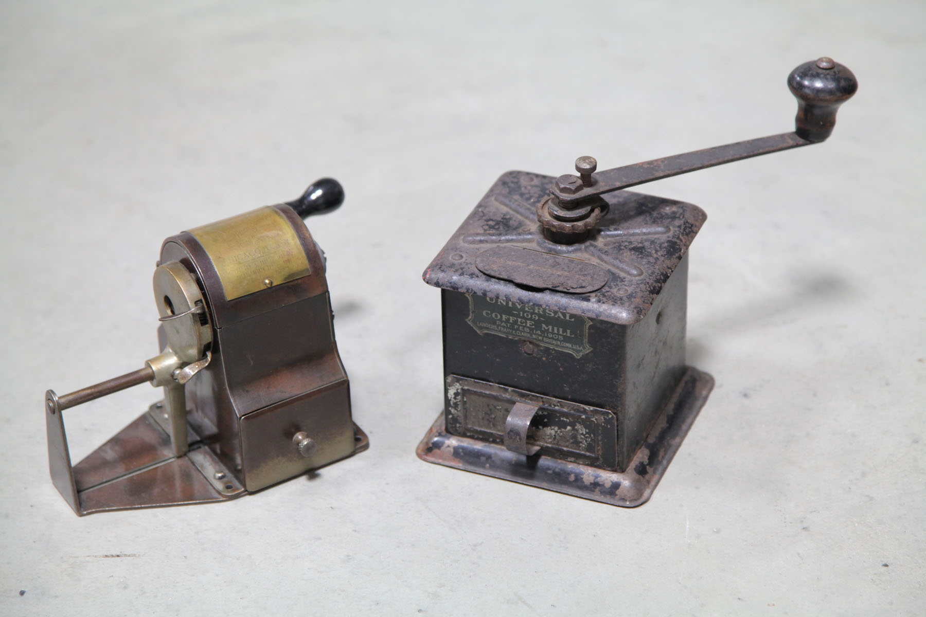 Appraisal: TIN COFFEE MILL AND CLIMAX PENCIL SHARPENER American early th