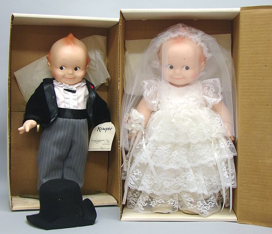 Appraisal: Pair of vinyl tagged Kewpies Bride and groom dolls dressed