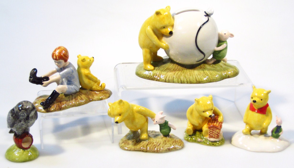 Appraisal: A collection of Royal Doulton Winnie The Pooh figures to